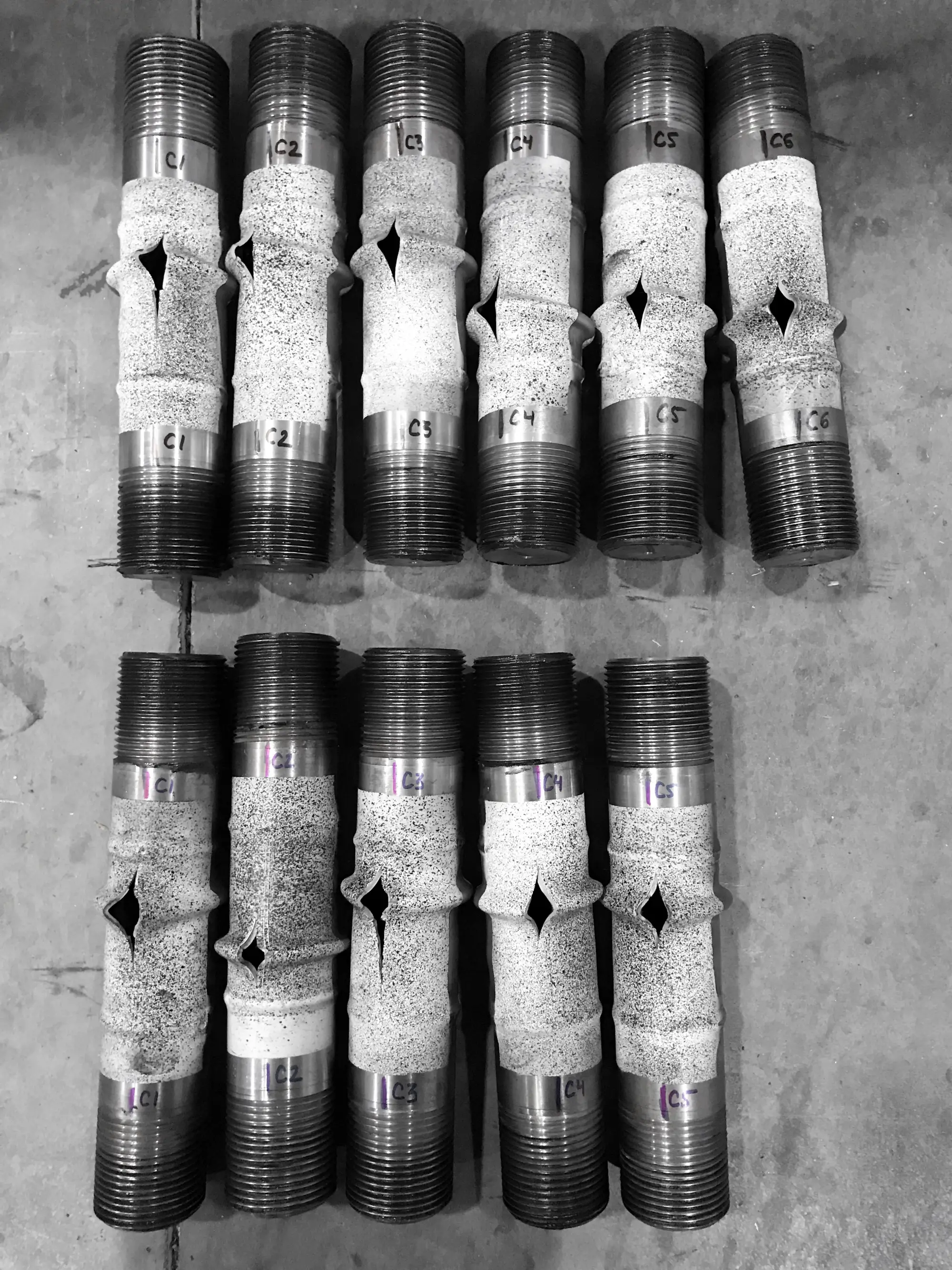 Automotive Tubes After the Axial Compression Testing, FADI-AMT